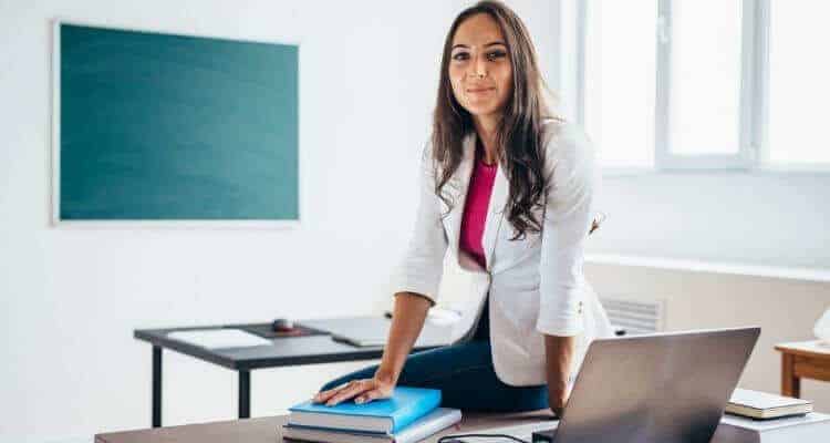 a nurse educator standing in front of the classroom