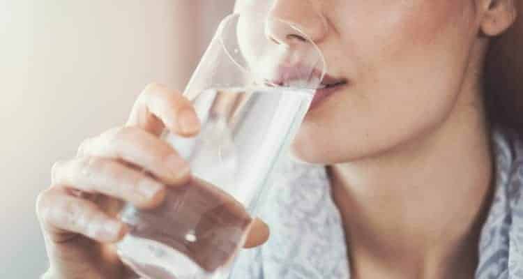 a nurse drinking water