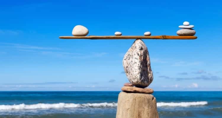 rocks that are balanced on top of another rock