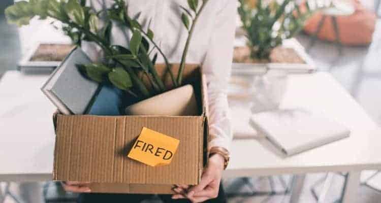 a nurse packing their belongings after getting fired