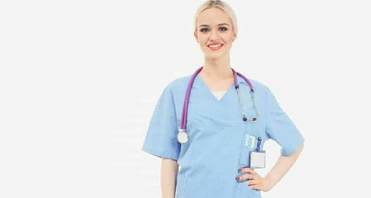 a tall nurse wearing scrubs