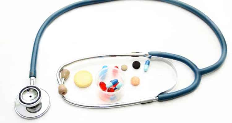 stethoscope next to individual meds