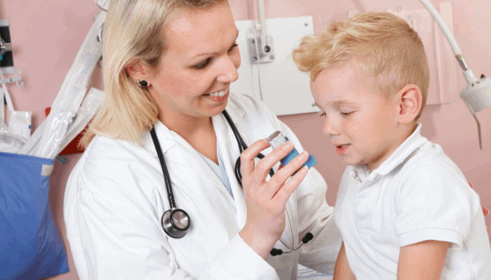 respiratory therapist treating a pediatric patient