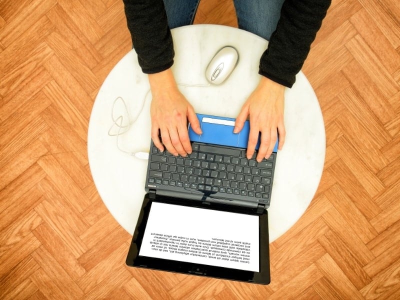 nursing student typing on computer