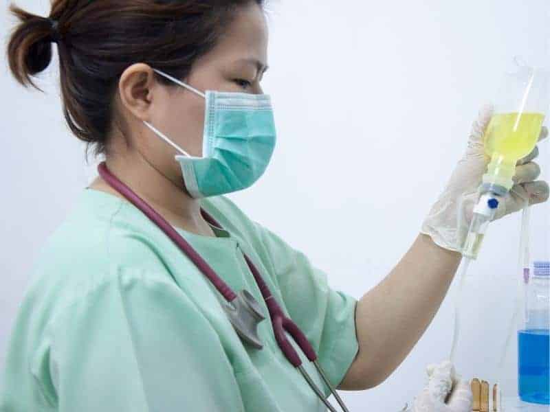 a nurse giving medications