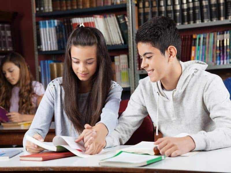 couple studying at the library