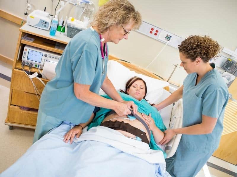 Article Image -  Nurses Preparing Pregnant Woman