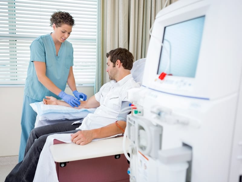 nurse dialysis with patient