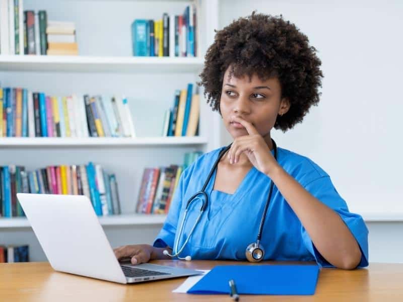 nurse in library thinking