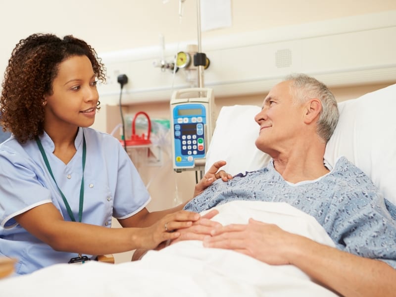 nurse talking to patient