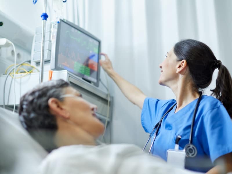 nurse monitoring patient